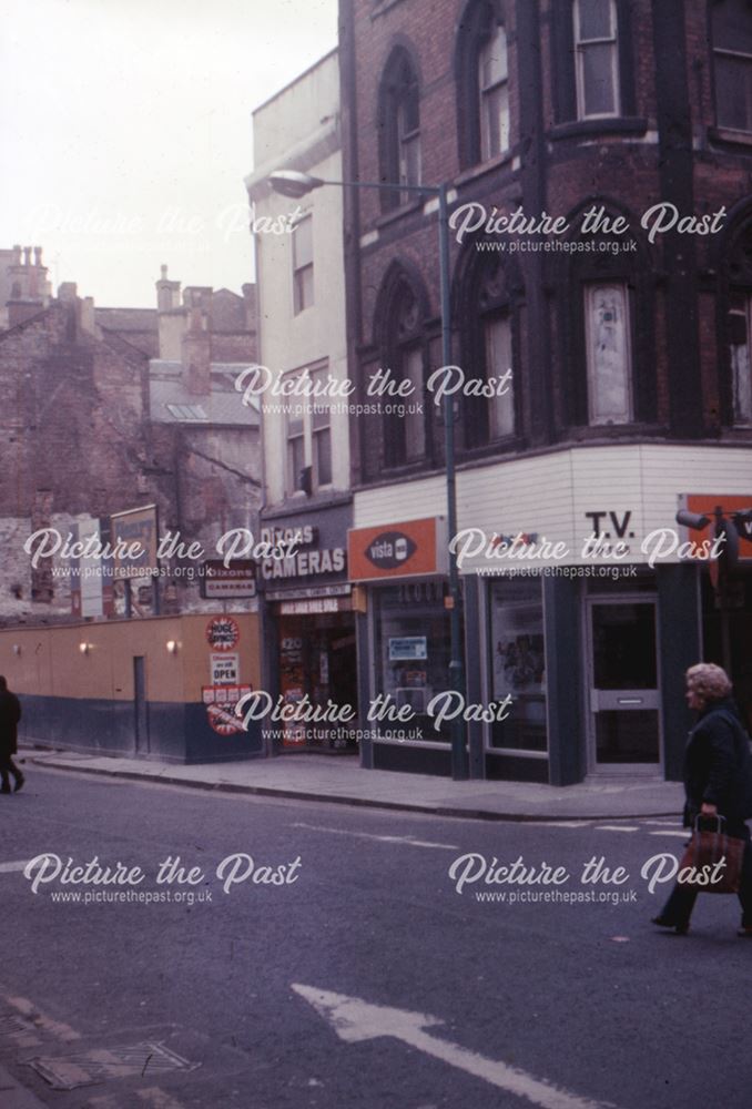 View of the shops on the corner of Cornmarket and St. James's Street