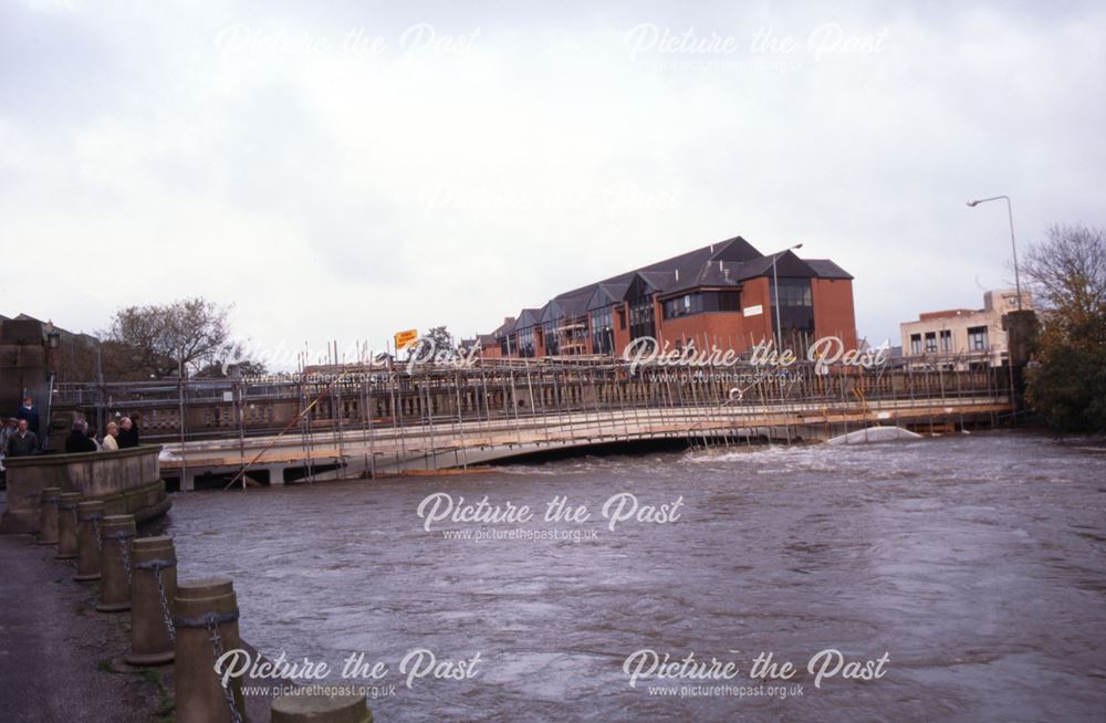 Flood water fills river under Exeter Bridge