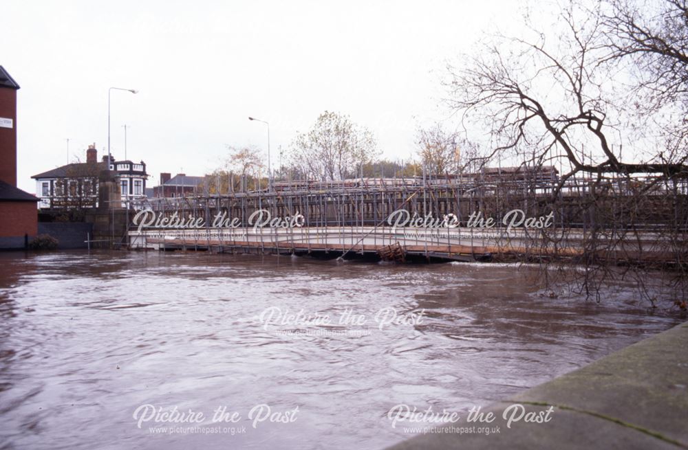 Flood water rises to fill arches under Exeter Bridge