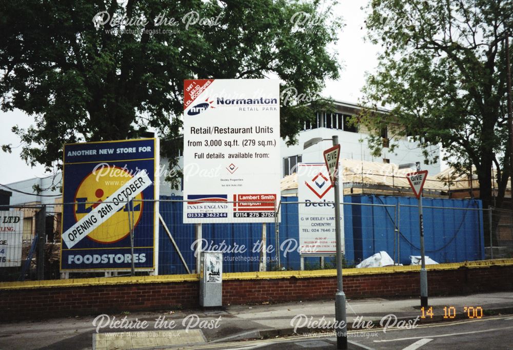 Signs advertising the opening of 'Normanton Retail Park', 2000