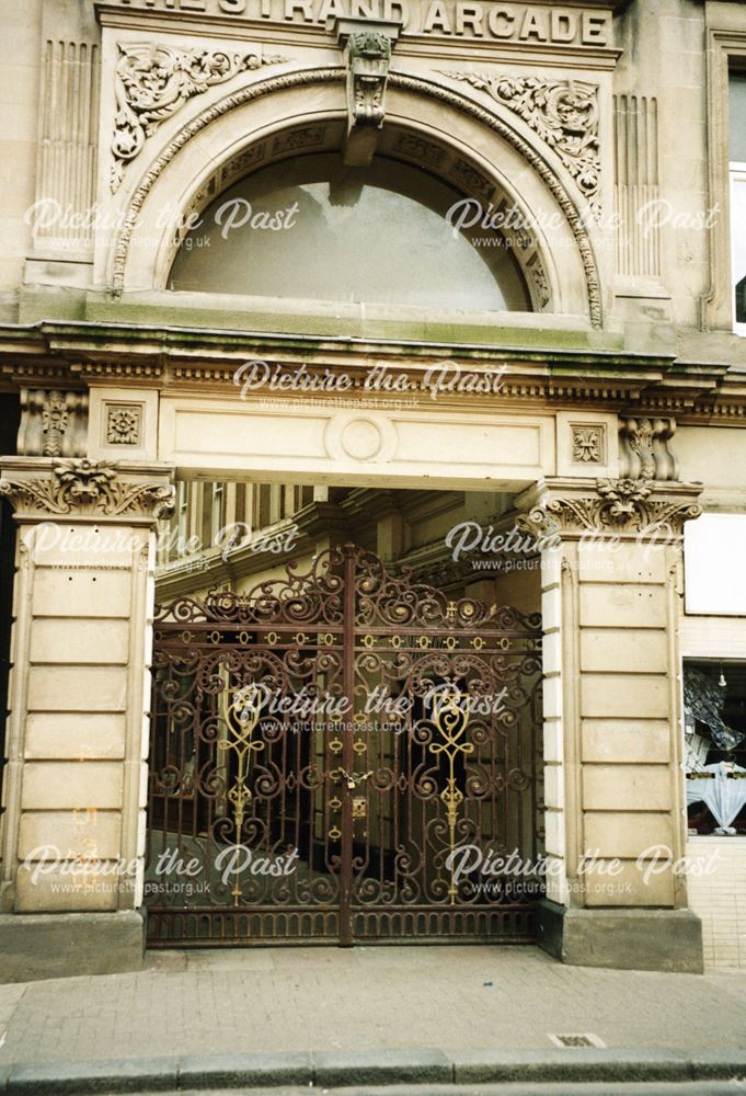 Ornate entrance gates to the Strand Shopping Arcade running between the Strand and Sadler Gate, Derb