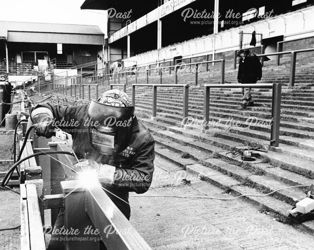 Taking down of fences at the Baseball Ground, Derby, 1990