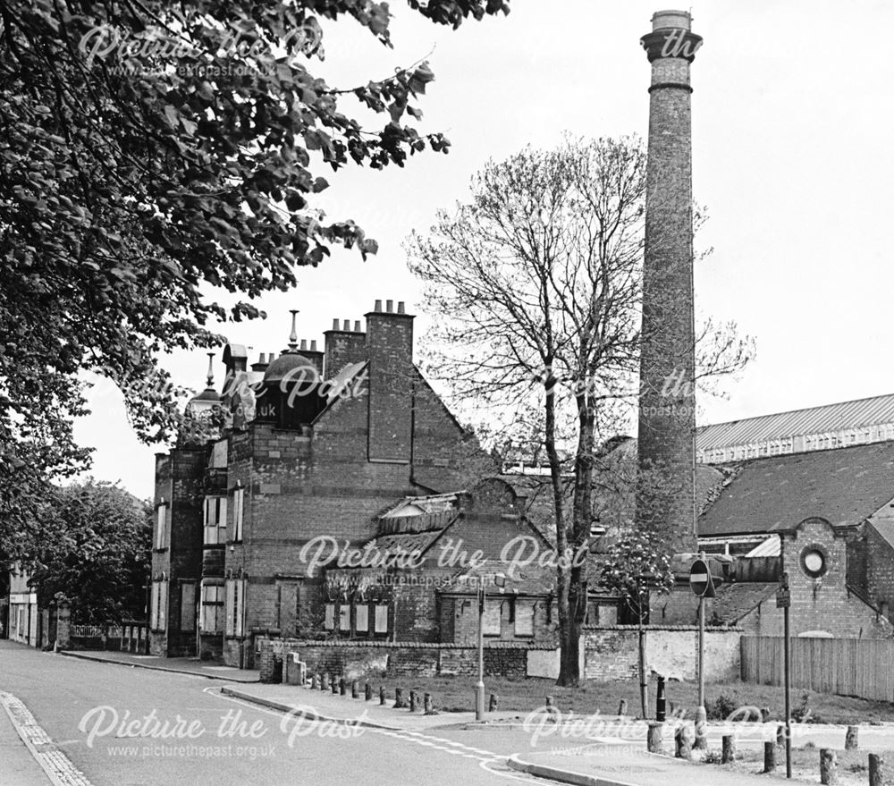 Reginald Street swimming baths after closure and before demolition of chimney and side section, Rose