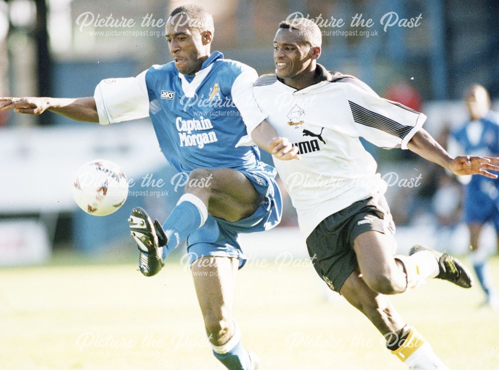 Derby County player Darryl Powell hustles for the ball, 1995