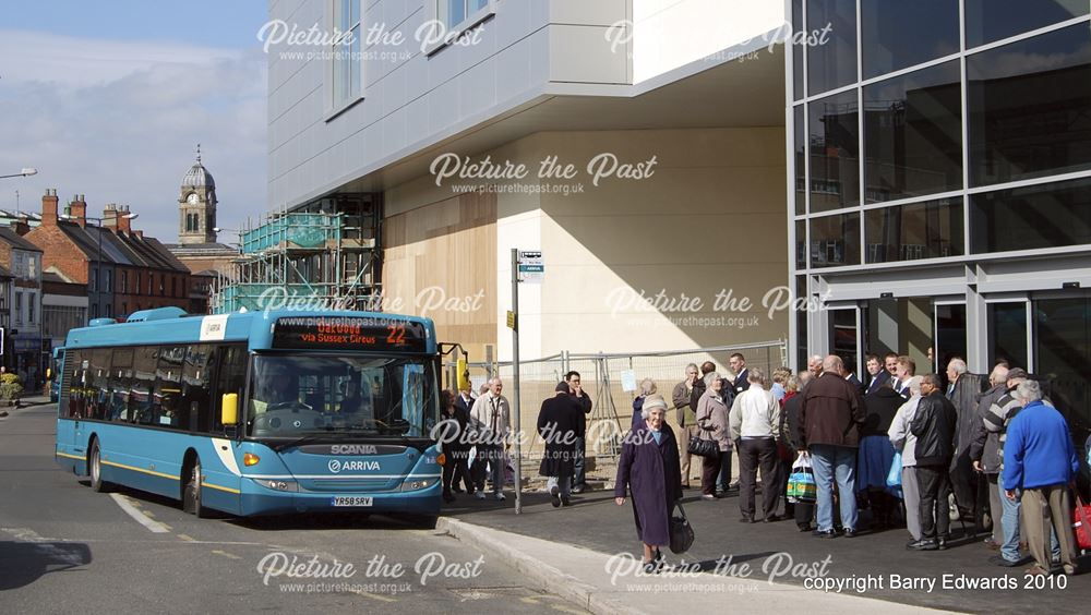 Arriva Scania Omnicty 3554 with members of the public waiting to inspect new bus station , Morledge,
