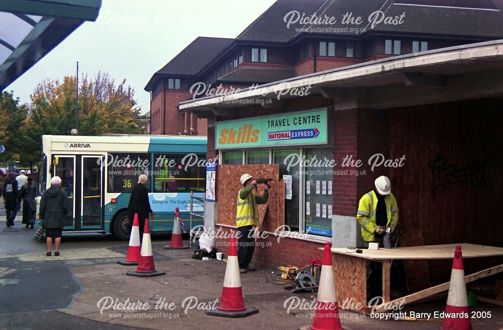 Bus Station last day contractors board up Travel Centre 