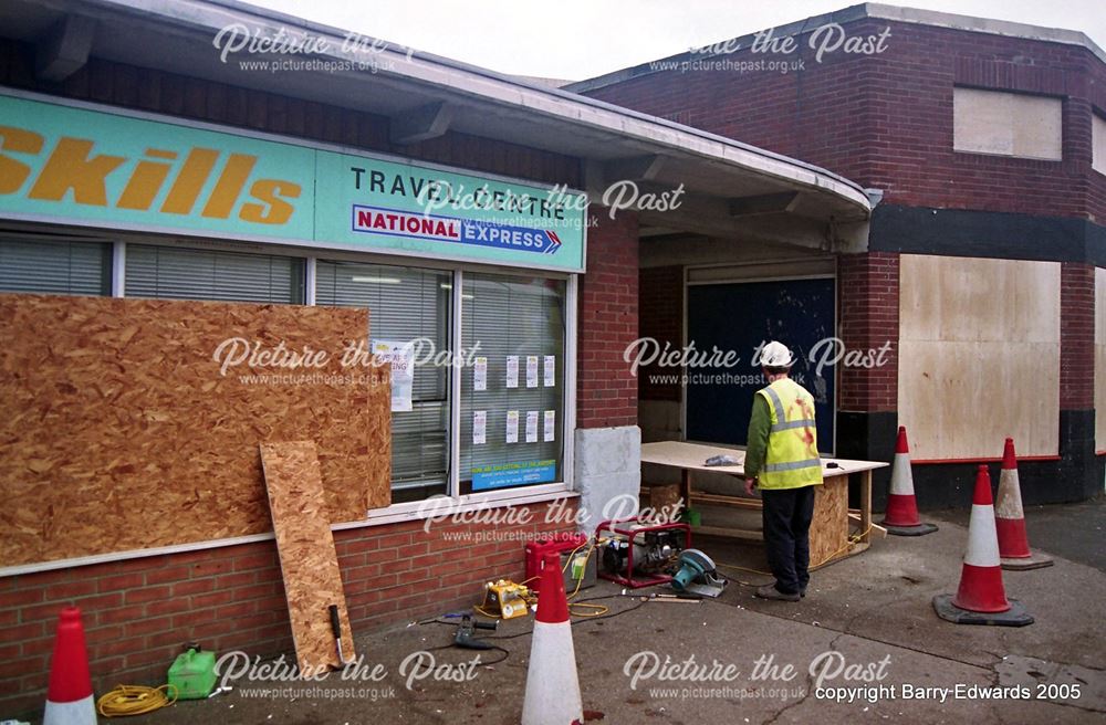 Bus Station last day contractors board up Travel Centre 