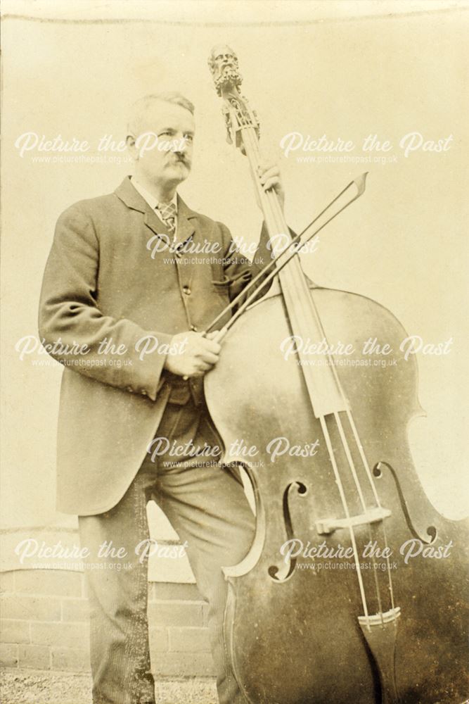 Mr John Brown of Ripley Verdi Orchestra with his Double Bass, c 1910